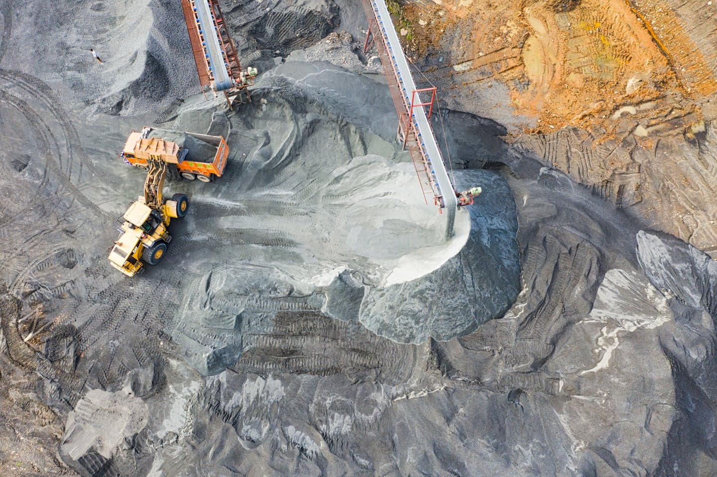 Mining quarry with excavators and heavy machinery